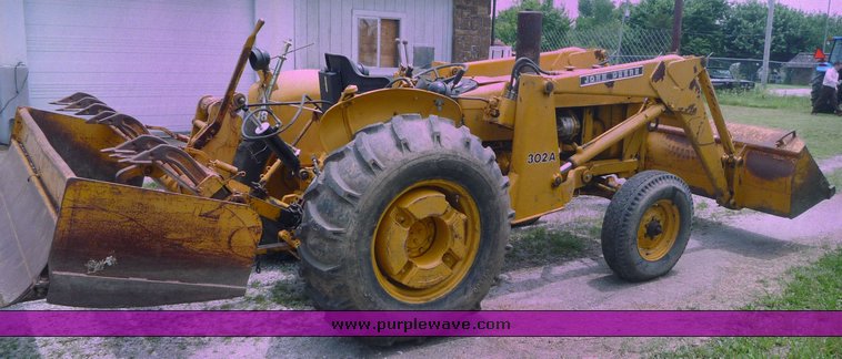 image for item 1801 1981 John Deere 302A tractor with loader