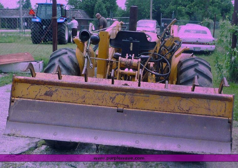 image for item 1801 1981 John Deere 302A tractor with loader