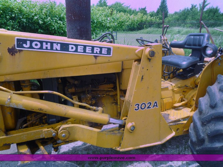 image for item 1801 1981 John Deere 302A tractor with loader