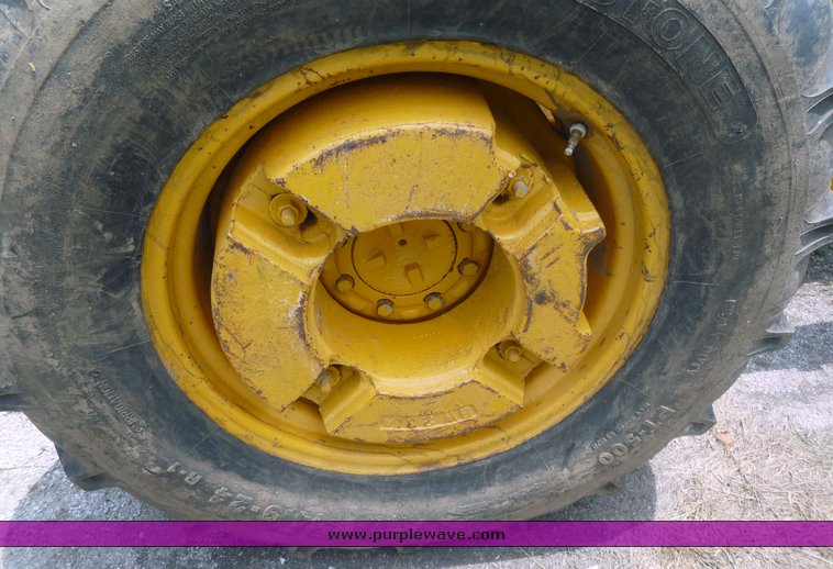 image for item 1801 1981 John Deere 302A tractor with loader