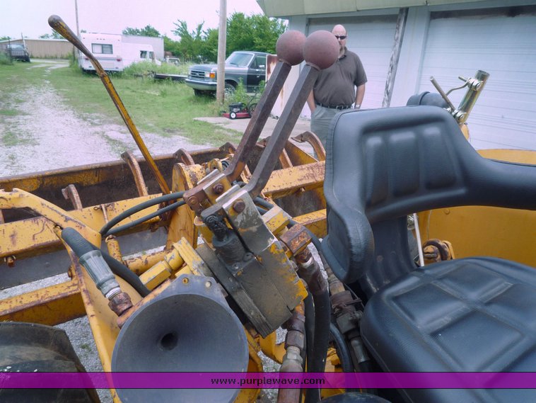 image for item 1801 1981 John Deere 302A tractor with loader