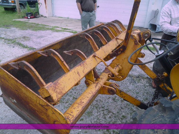 image for item 1801 1981 John Deere 302A tractor with loader