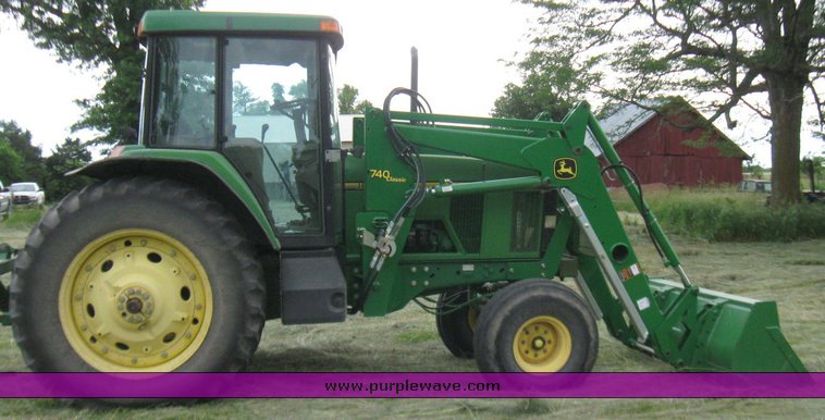 image for item 2355 1996 John Deere 7400 tractor with loader