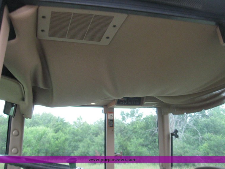 image for item 2355 1996 John Deere 7400 tractor with loader