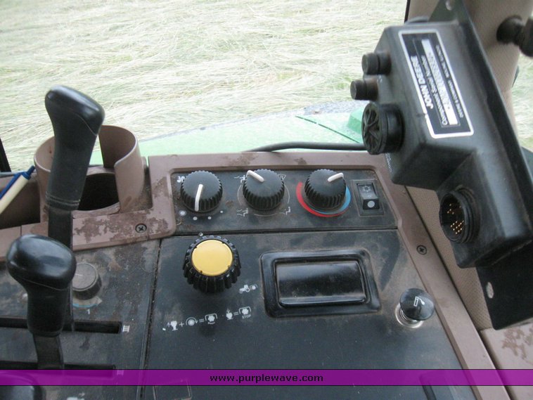 image for item 2355 1996 John Deere 7400 tractor with loader