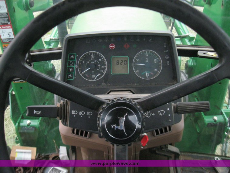 image for item 2355 1996 John Deere 7400 tractor with loader