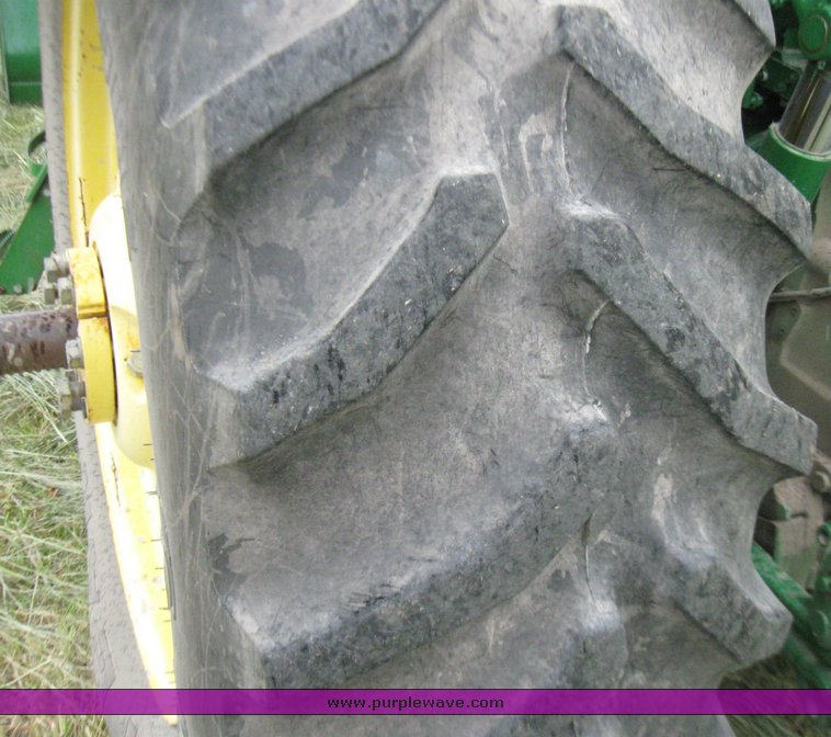 image for item 2355 1996 John Deere 7400 tractor with loader