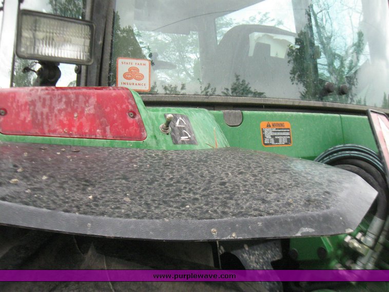 image for item 2355 1996 John Deere 7400 tractor with loader