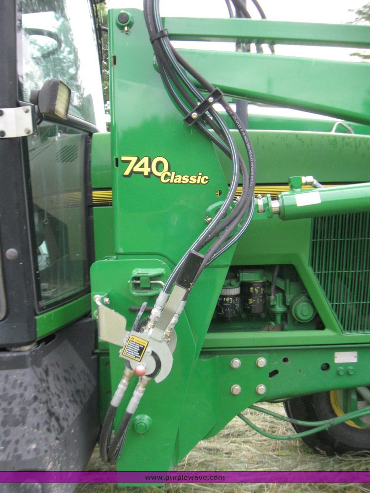 image for item 2355 1996 John Deere 7400 tractor with loader