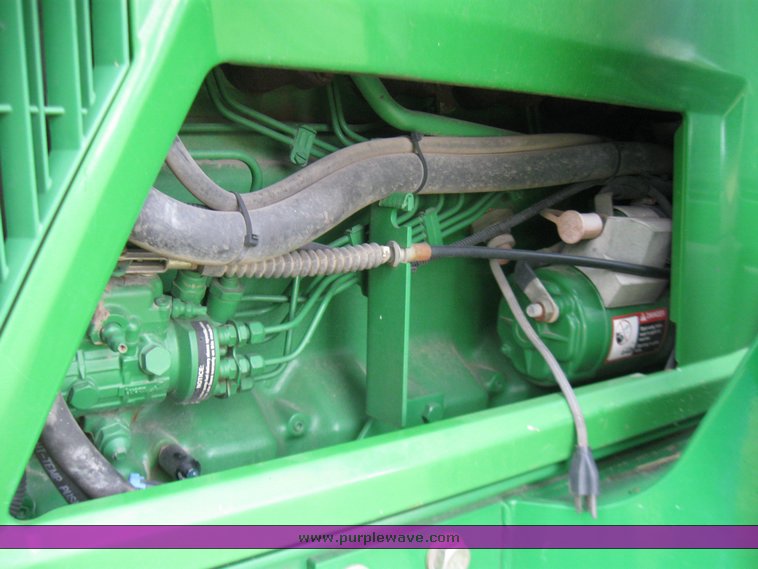 image for item 2355 1996 John Deere 7400 tractor with loader