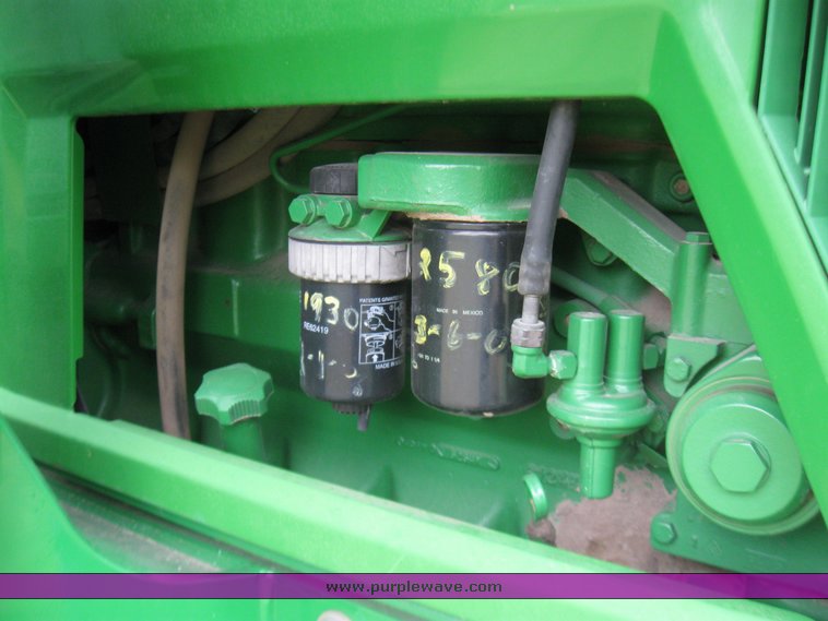 image for item 2355 1996 John Deere 7400 tractor with loader