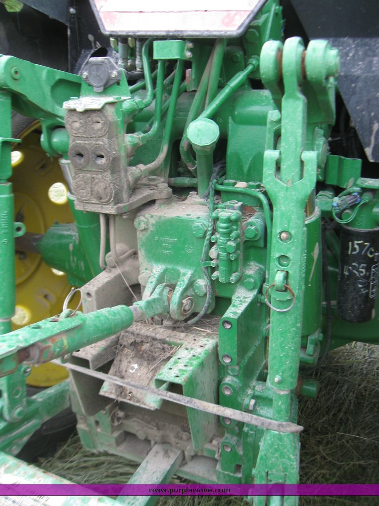 image for item 2355 1996 John Deere 7400 tractor with loader