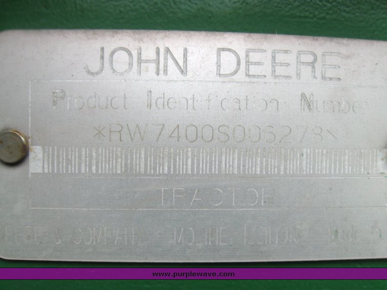 image for item 2355 1996 John Deere 7400 tractor with loader