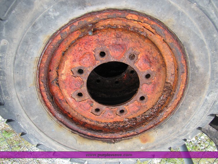 image for item 3338 (4) skidsteer wheels and tires