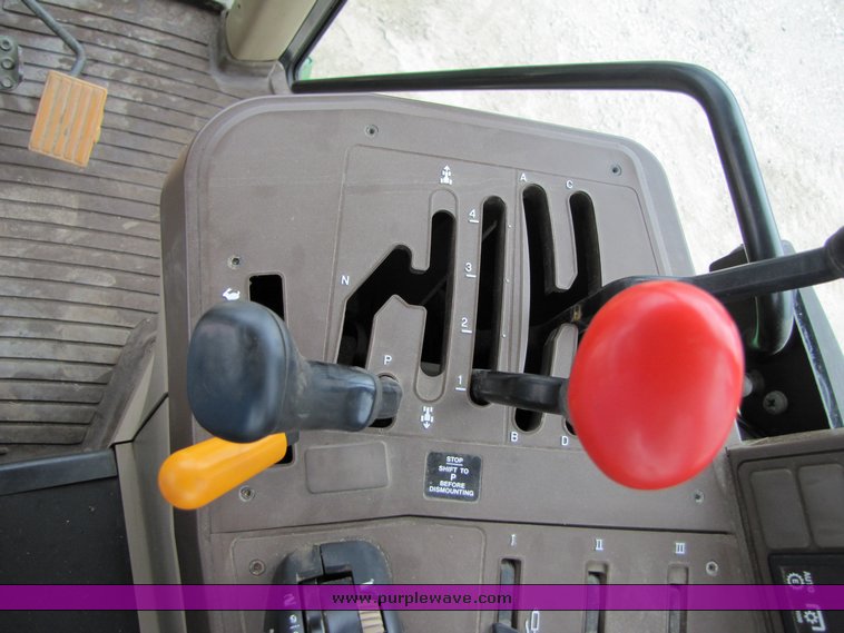 image for item 3356 John Deere 6410 MFWD tractor