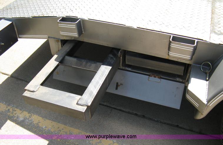 image for item 5028 2006 Buck Dandy 18' tandem axle flat bed trailer