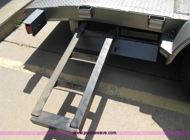 image for item 5028 2006 Buck Dandy 18' tandem axle flat bed trailer