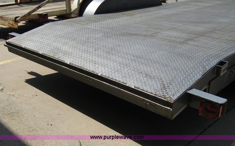 image for item 5028 2006 Buck Dandy 18' tandem axle flat bed trailer