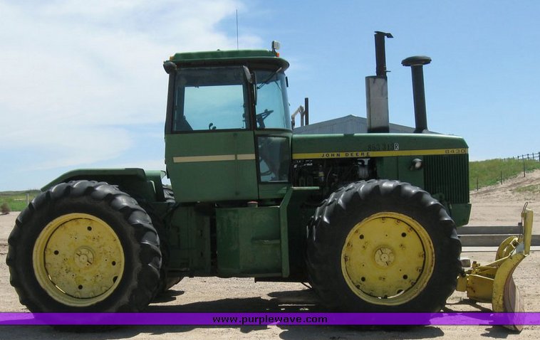 image for item 6794 1975 John Deere 8430 4WD tractor with dozer blade