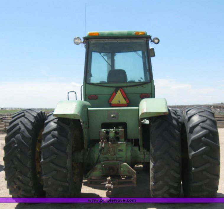 image for item 6794 1975 John Deere 8430 4WD tractor with dozer blade