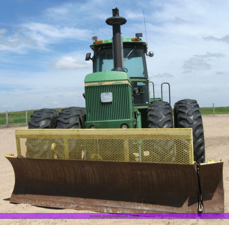 image for item 6794 1975 John Deere 8430 4WD tractor with dozer blade