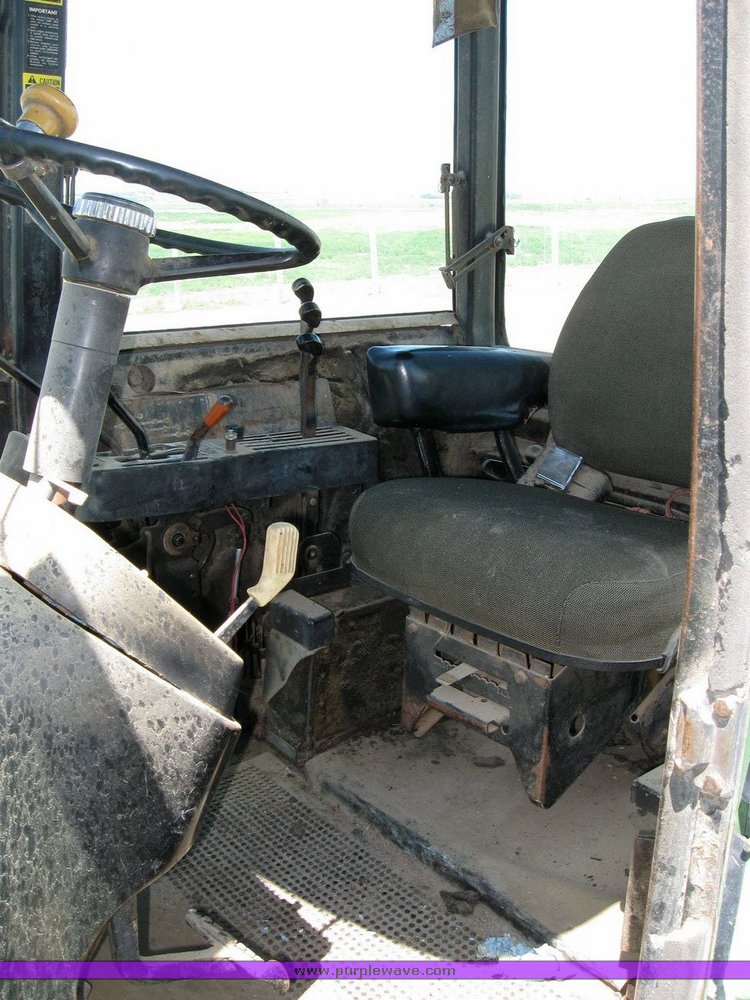 image for item 6794 1975 John Deere 8430 4WD tractor with dozer blade