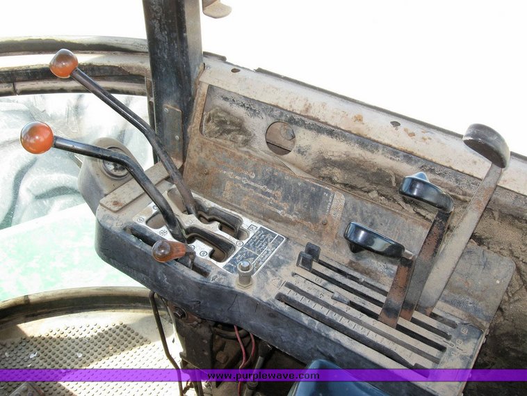 image for item 6794 1975 John Deere 8430 4WD tractor with dozer blade