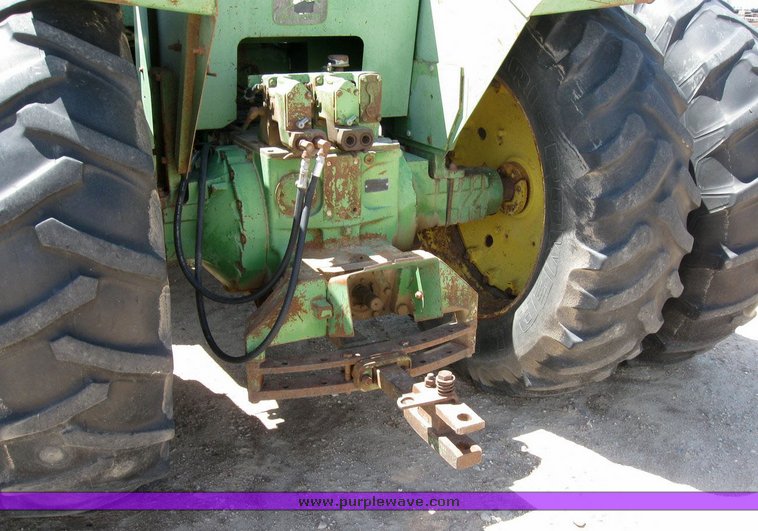 image for item 6794 1975 John Deere 8430 4WD tractor with dozer blade