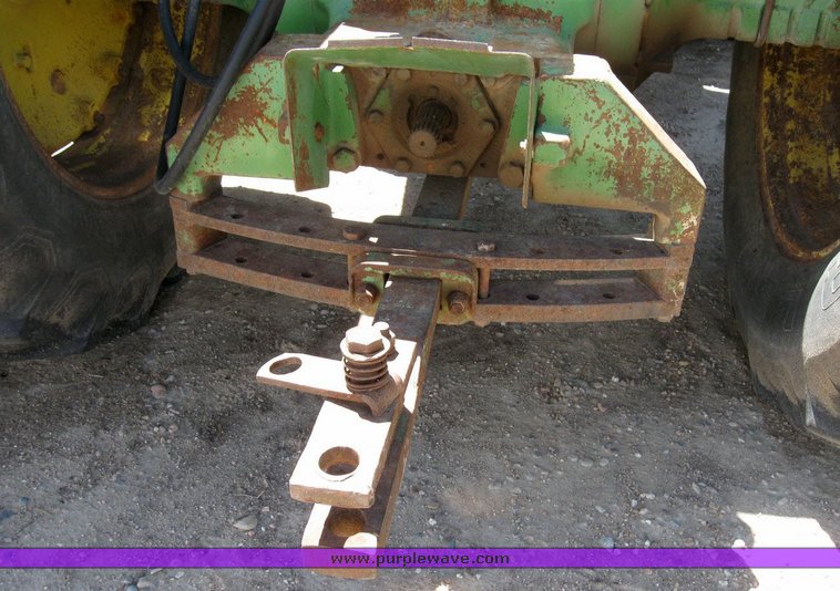 image for item 6794 1975 John Deere 8430 4WD tractor with dozer blade