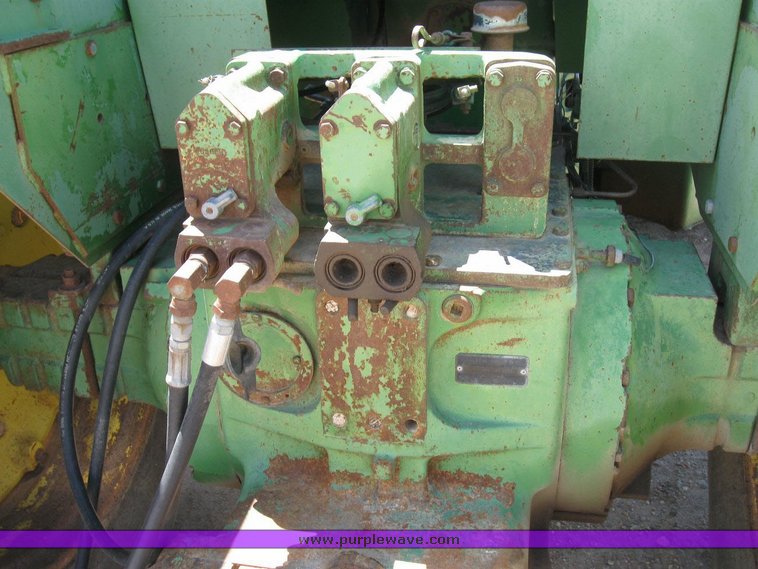 image for item 6794 1975 John Deere 8430 4WD tractor with dozer blade