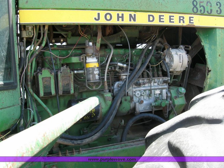 image for item 6794 1975 John Deere 8430 4WD tractor with dozer blade