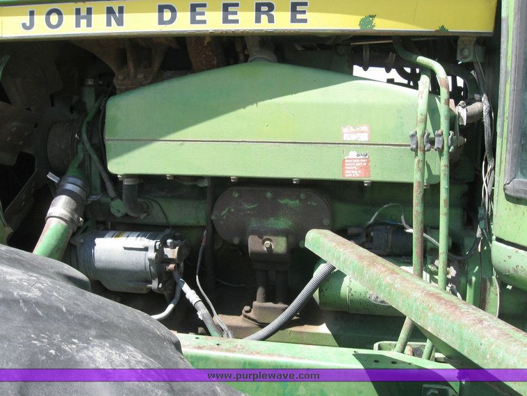 image for item 6794 1975 John Deere 8430 4WD tractor with dozer blade