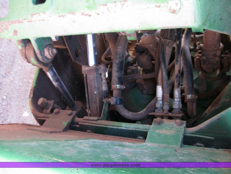 image for item 6794 1975 John Deere 8430 4WD tractor with dozer blade