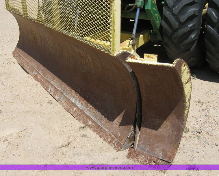 image for item 6794 1975 John Deere 8430 4WD tractor with dozer blade