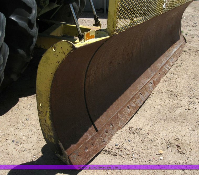 image for item 6794 1975 John Deere 8430 4WD tractor with dozer blade