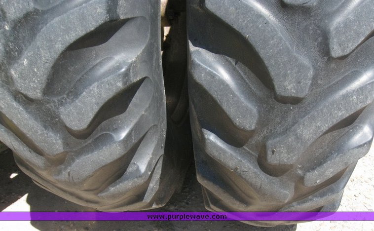 image for item 6794 1975 John Deere 8430 4WD tractor with dozer blade