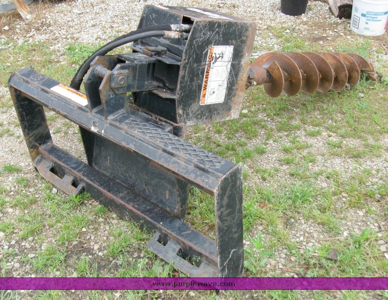 Lowe post hole digger in Cherryvale, KS Item 7248 sold Purple Wave