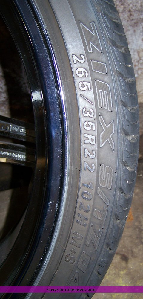 image for item 8204 (4) 265-35R22 102H Falken tires on Incubus rims