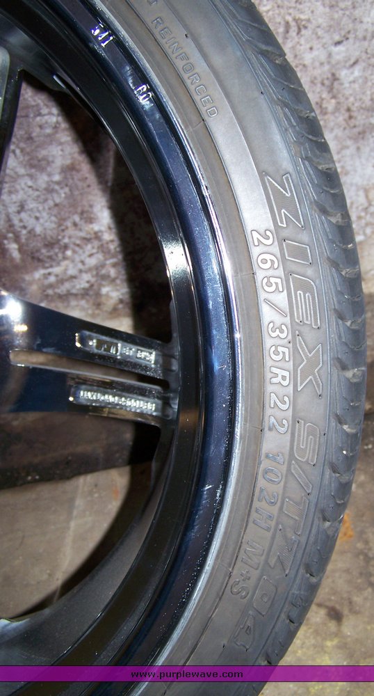 image for item 8204 (4) 265-35R22 102H Falken tires on Incubus rims