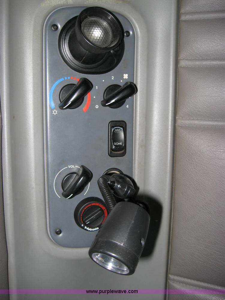 image for item 2030 2004 Freightliner Conventional Columbia 120 semi truck