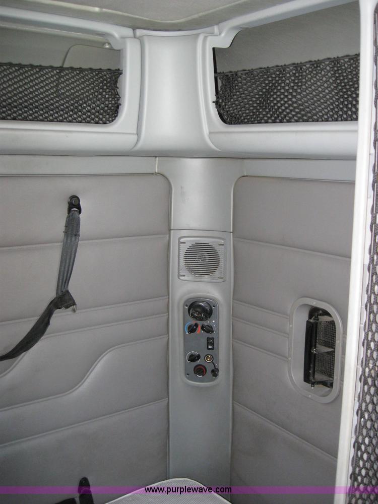 image for item 2032 2004 Freightliner Conventional Columbia 120 semi truck