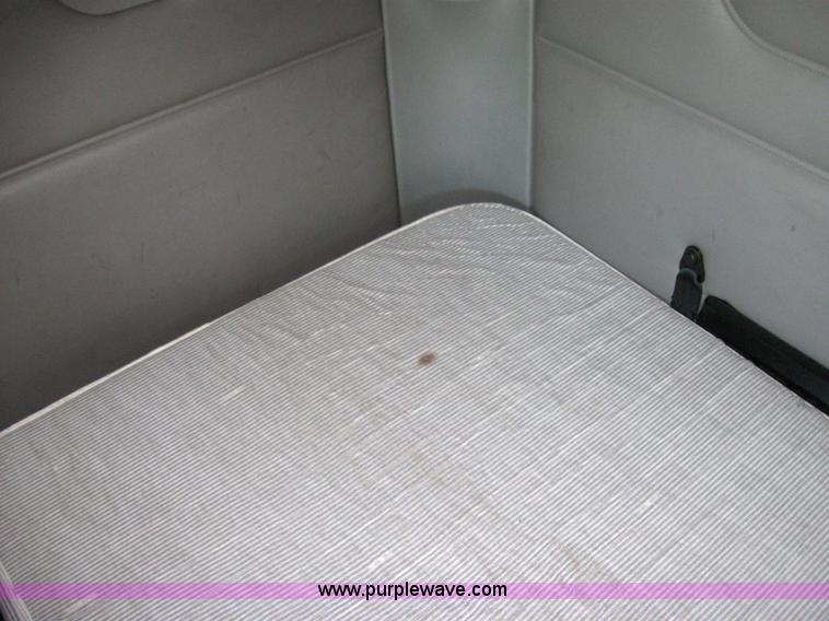 image for item 2032 2004 Freightliner Conventional Columbia 120 semi truck