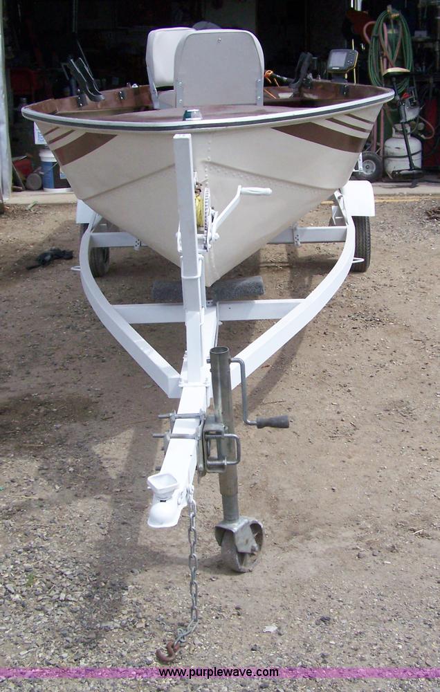 image for item 4034 1968 Cornair 14' aluminum boat with trailer