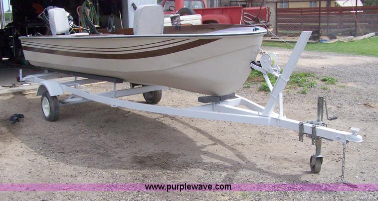 image for item 4034 1968 Cornair 14' aluminum boat with trailer