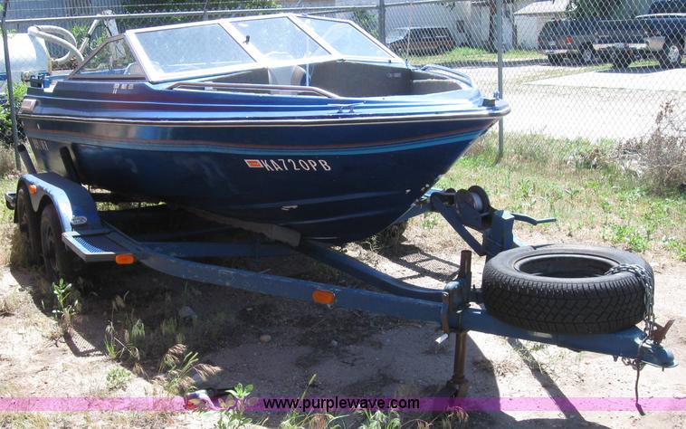 image for item 6814 Bayliner Capri 15' boat with trailer