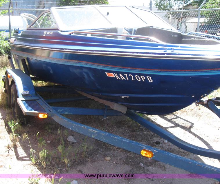 image for item 6814 Bayliner Capri 15' boat with trailer