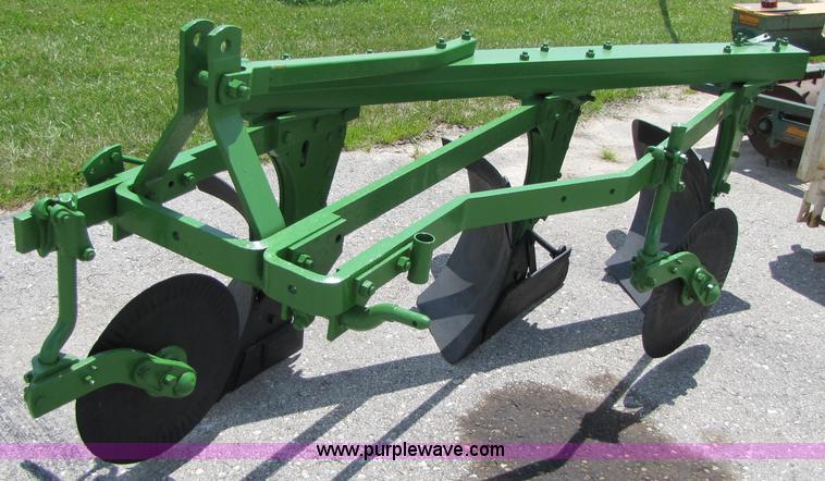 image for item 3529 John Deere 1250 three bottom plow