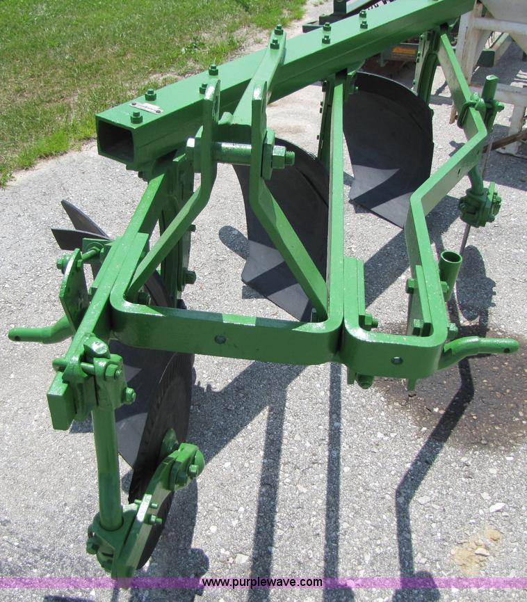 image for item 3529 John Deere 1250 three bottom plow
