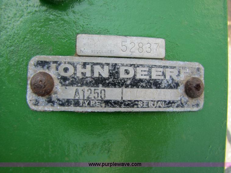 image for item 3529 John Deere 1250 three bottom plow