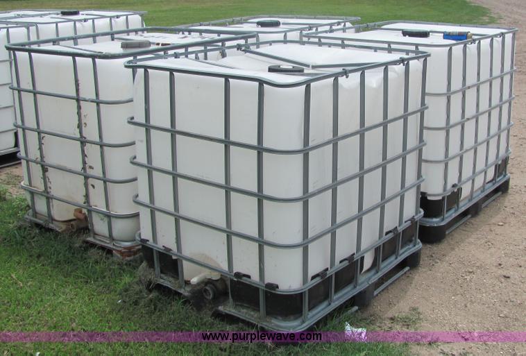 image for item 6634 (4) 225 gallon fluid totes
